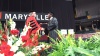 student receiving diploma at maryville graduation