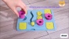 Show in main carousel: fouFIT Hide 'n Seek Multi-Play Busy Board Puzzle Dog Treat Dispenser Toy, Multicolor slide 8 of 8