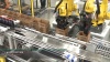 Empaquetado de botellas con carga superior
