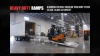 HD Ramps Portable Yard Ramp Set Up with Two Men and a Forlift Inside a Warehouse