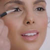 Video of model using the angled eyeliner brush end of the Arc Brush to achieve a winged eye look in three steps